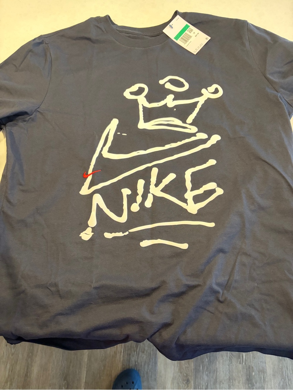 Nike Men’s Navy Graphic Logo Short Sleeve Tee with Red Swoosh